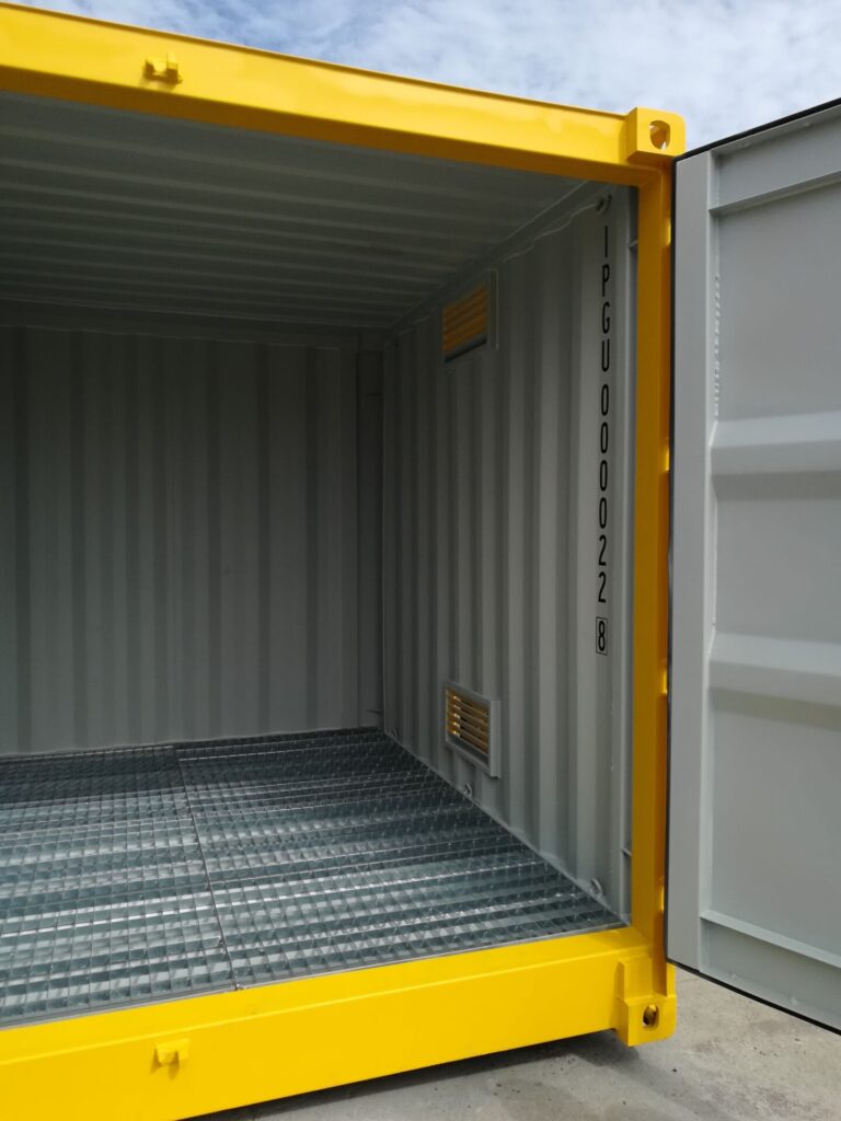 Interior of an empty yellow 10’HC Dangerous Goods Shipping Container.