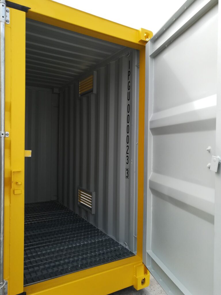 Interior of open yellow 10’HC Dangerous Goods Shipping Container with metal flo