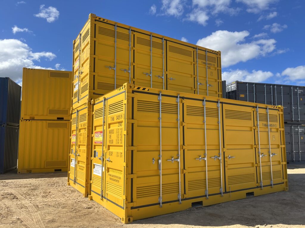 Open yellow shipping container showing interior with bund capacity markings, sur