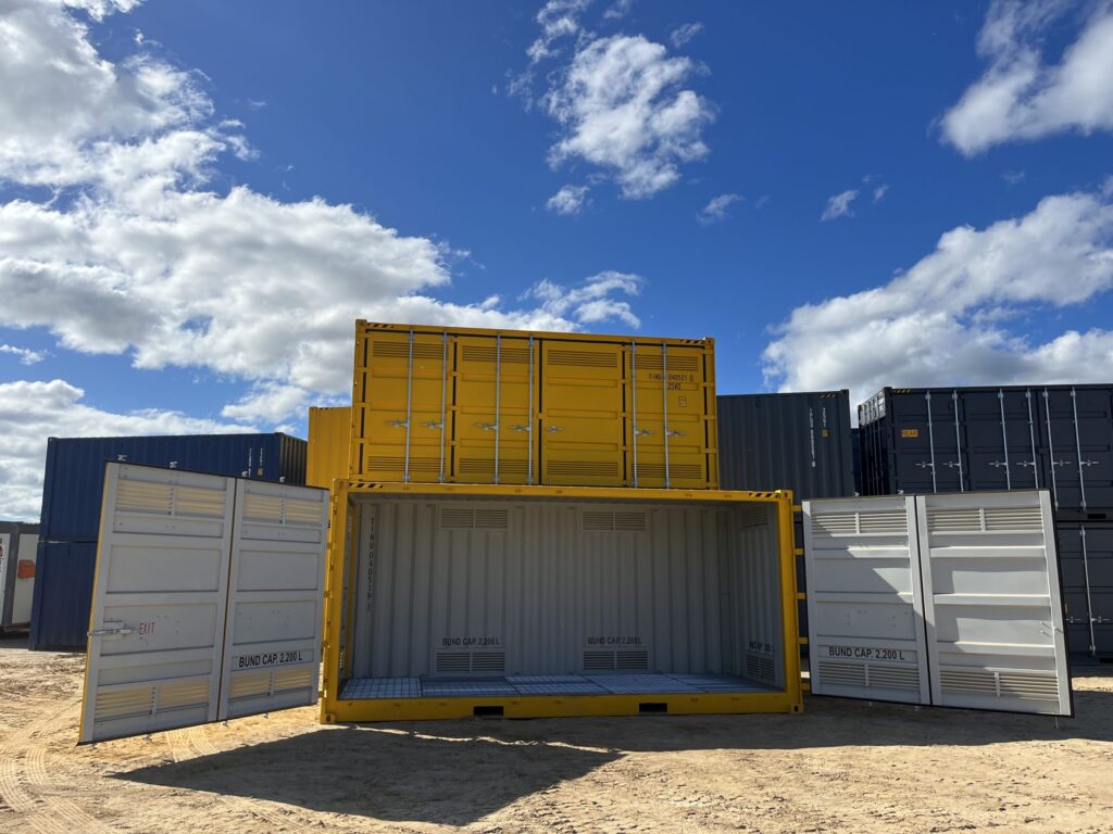 Yellow container with open doors, showcasing interior space labeled for bund cap