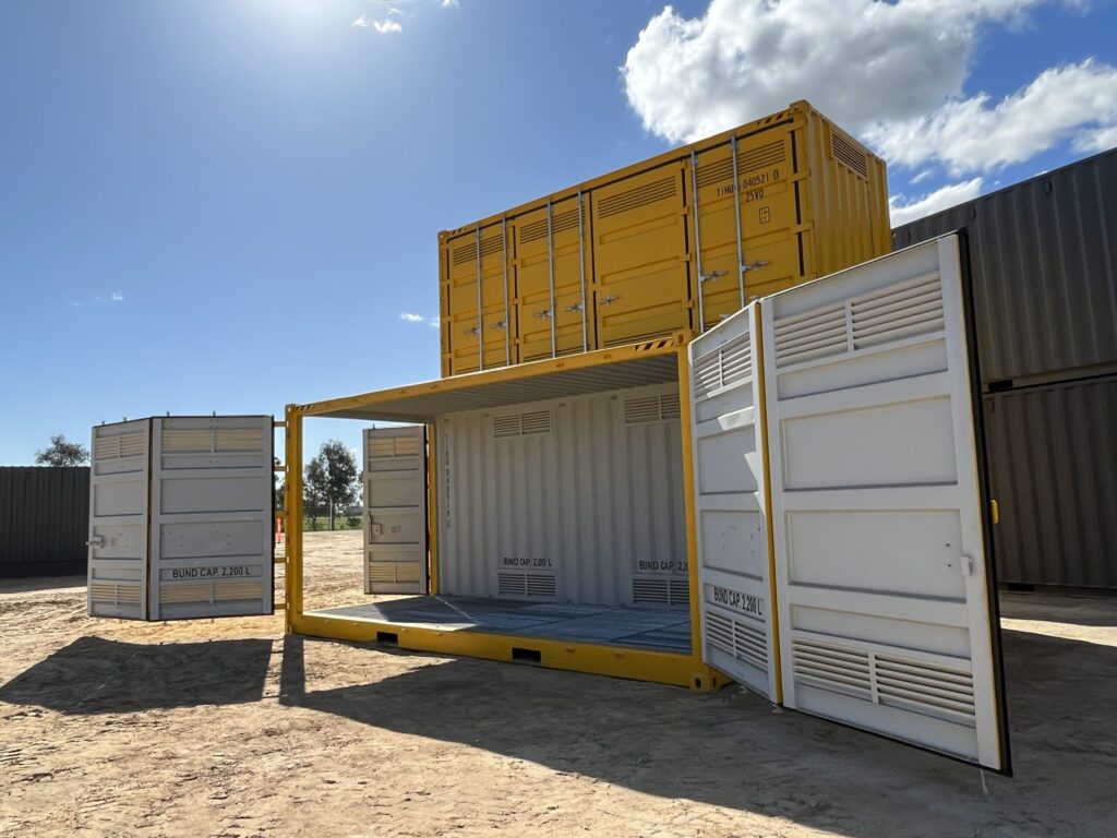 Yellow industrial container with open doors, revealing a clean and empty interio